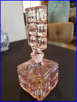 Collectible vintage perfume bottles, varied colors and styles, crystal, glass