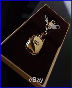 GOLD GUCCI PERFUME BOTTLE KEYRING PENDANT VINTAGE RARE 70s COLLECTABLE