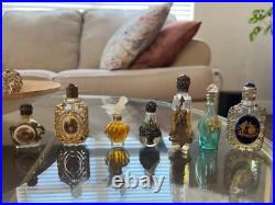 Mini perfume bottles vintage. Some have the perfume still, and one is sealed