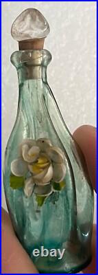 Mini perfume bottles vintage. Some have the perfume still, and one is sealed