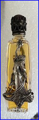 Mini perfume bottles vintage. Some have the perfume still, and one is sealed