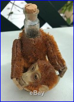 Schuco Vintage Monkey Perfume Bottle- Mohair on metal- very worn! RARE Orange