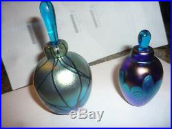 Two vintage blown glass perfume bottles, signed