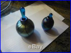 Two vintage blown glass perfume bottles, signed