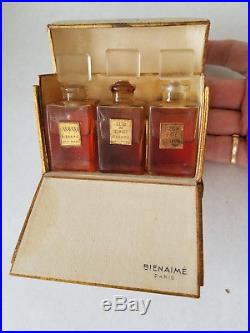 Vintage (1938) Bienaime wardrobe with perfume in bottles