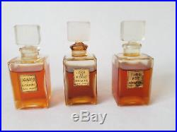 Vintage (1938) Bienaime wardrobe with perfume in bottles