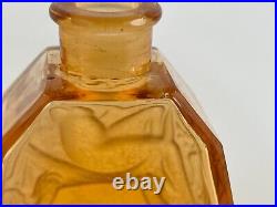 Vintage Amber / Orange Art Glass Perfume Bottle with Nude Scene Decorations