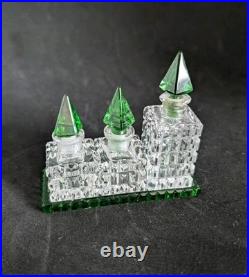Vintage Czechoslovakian green cut glass perfume bottle set Vintage Czechoslovakian green cut glass perfume bottle set