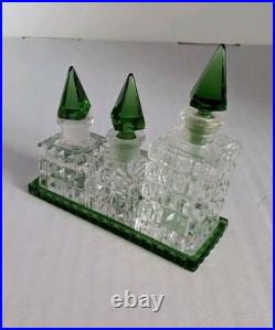 Vintage Czechoslovakian green cut glass perfume bottle set Vintage Czechoslovakian green cut glass perfume bottle set
