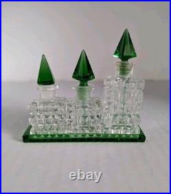 Vintage Czechoslovakian green cut glass perfume bottle set Vintage Czechoslovakian green cut glass perfume bottle set