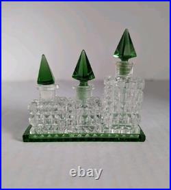 Vintage Czechoslovakian green cut glass perfume bottle set Vintage Czechoslovakian green cut glass perfume bottle set
