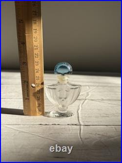Vintage Guerlain Shalimar crystal perfume bottle with blue stopper