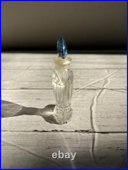 Vintage Guerlain Shalimar crystal perfume bottle with blue stopper