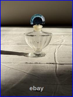 Vintage Guerlain Shalimar crystal perfume bottle with blue stopper