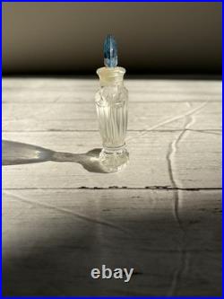 Vintage Guerlain Shalimar crystal perfume bottle with blue stopper
