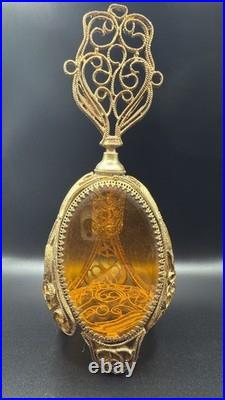 Vintage Ormolu Perfume Bottle Amber Glass Filigree Footed with Original Dauber