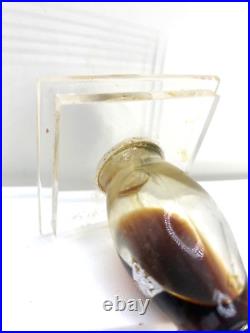 Vintage perfume bottle withlucite stand. Sealed. EDP. Gri Gri by Weil. 1943